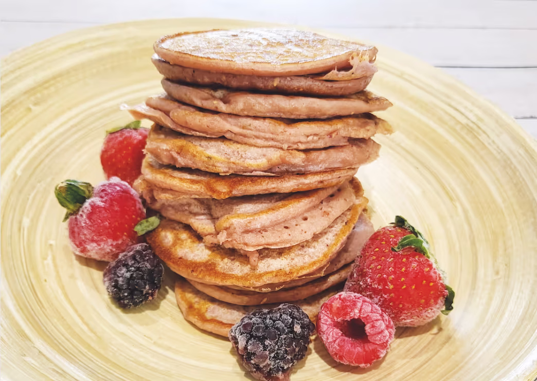 Stack of pancakes with berry fruits