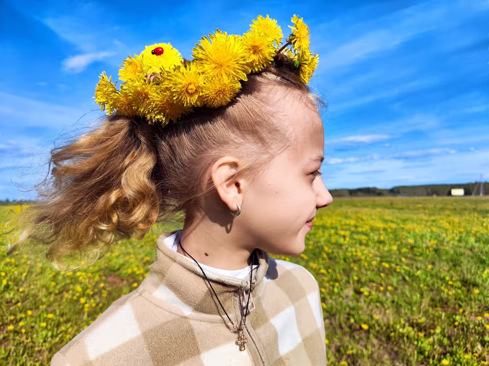 Girl wearing a dandelions crown